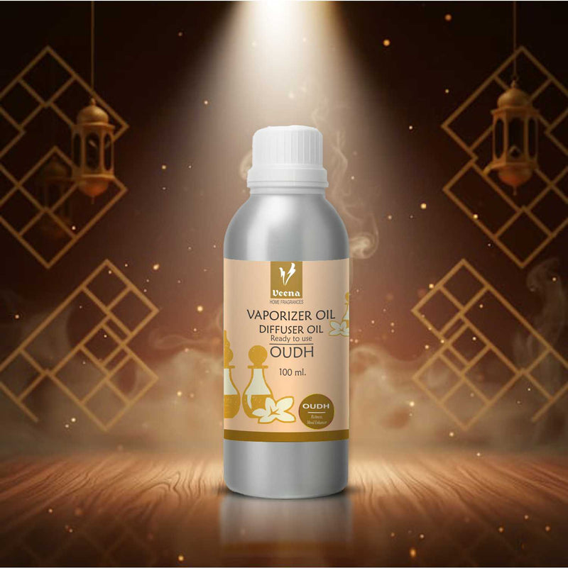 Veena Oudh Premium Vaporizer and Diffuser Oil 100ml canister highlighted under a dramatic spotlight beam on a dark luxury wooden stage.