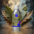 Veena Saffron Tobacco Premium Vaporizer and Diffuser Oil 100ml bottle standing against a dramatic background of dry tobacco leaves and rising incense smoke.
