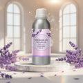 Veena Lavender Vaporizer and Diffuser Oil 100ml bottle sitting on a white marble platform surrounded by fresh purple lavender bouquets.