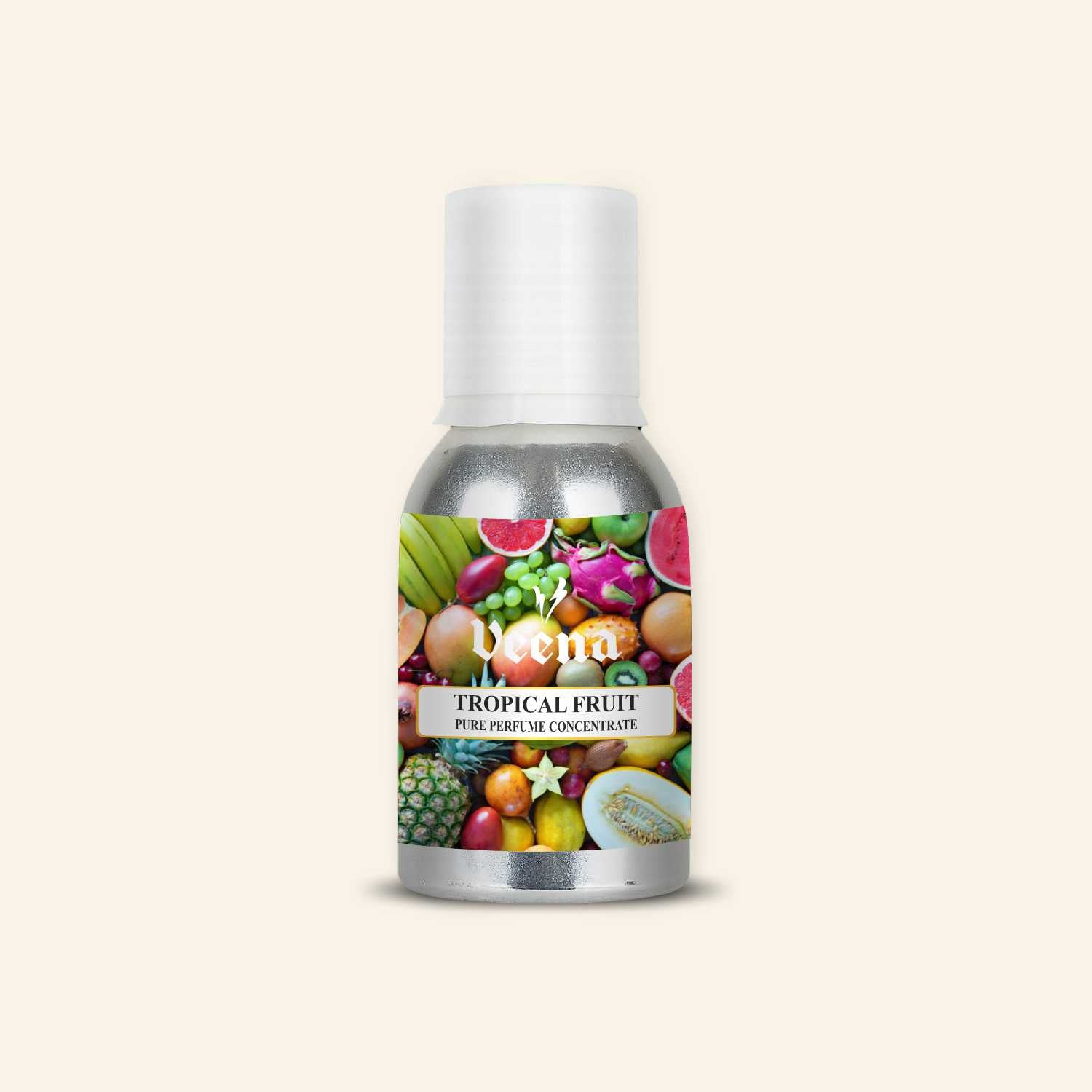 Veena Tropical Fruit Pure Perfume Concentrate bottle with a rich, colorful label collage featuring pineapple, melon, kiwi, dragon fruit, and berries.