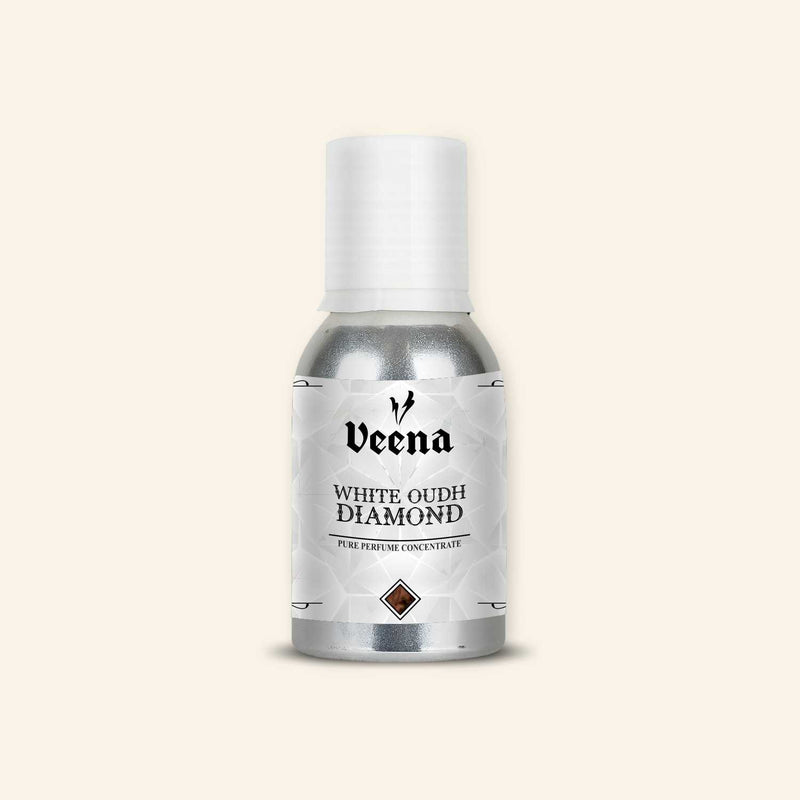 Veena White Oudh Diamond Pure Perfume Concentrate aluminum bottle with premium geometric white diamond texture label design.