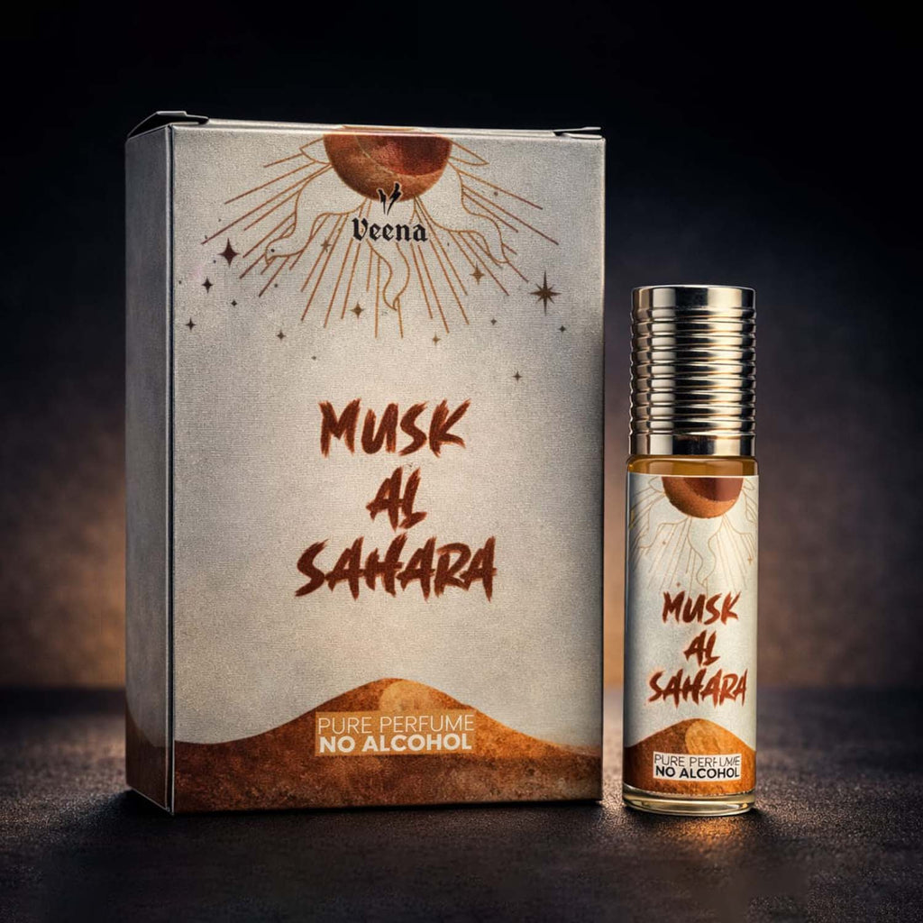 Veena luxury Musk Al Sahara perfume oil pocket roll-on standing next to its premium silver and gold desert presentation box.