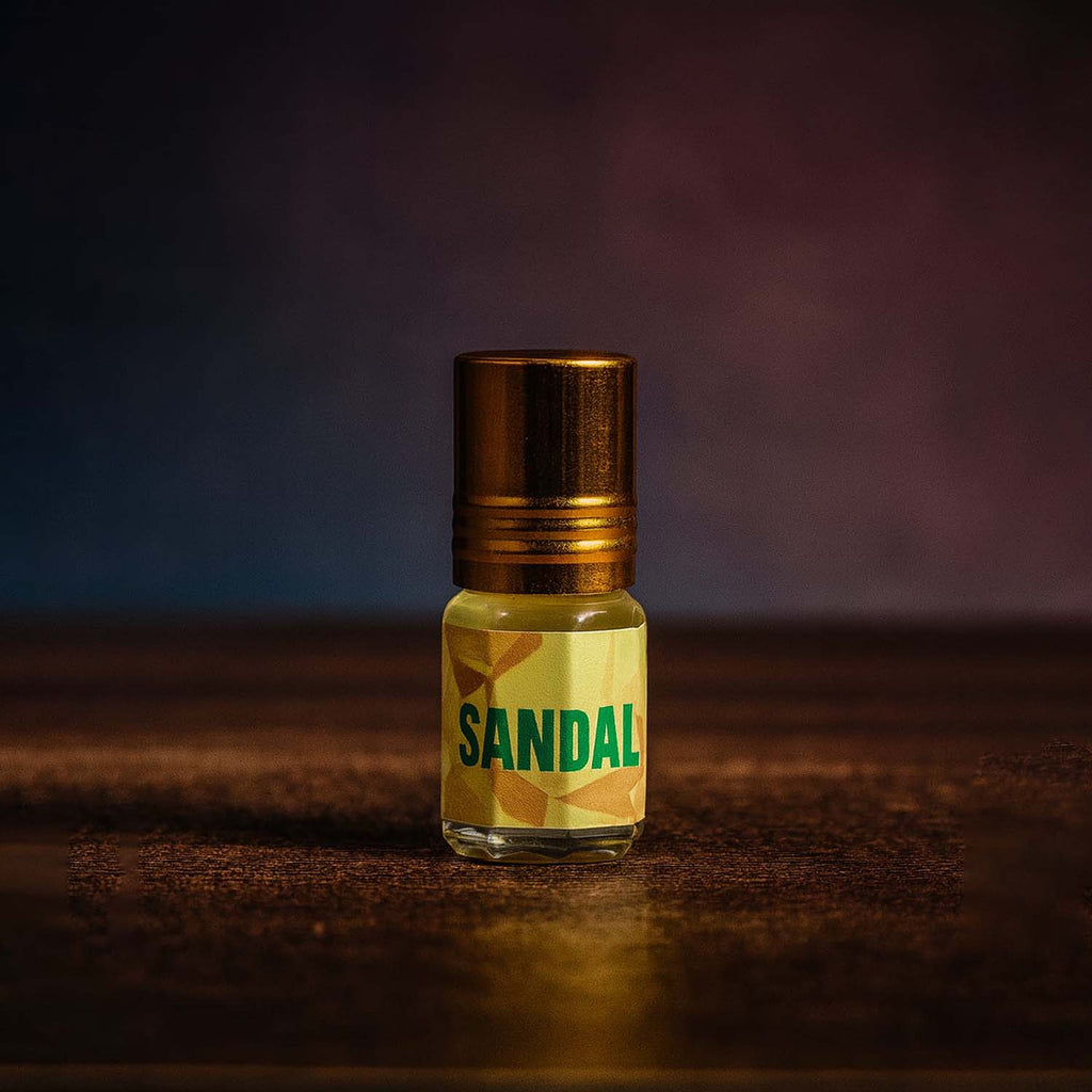 Veena luxury non-alcoholic Sandal Chandan perfume oil bottle highlighted on a rich dark textured studio surface.