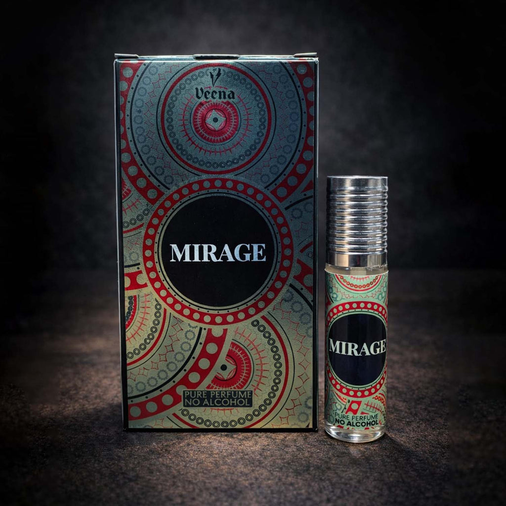 Veena luxury Mirage perfume oil pocket roll-on standing next to its premium silver, red, and green geometric presentation box.