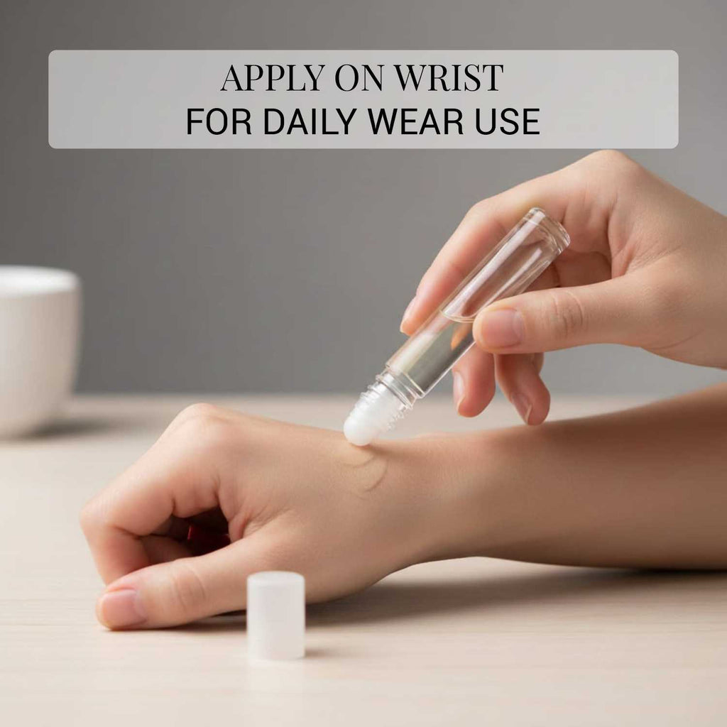 A person applying an alcohol-free pure perfume roll-on onto their inner wrist for everyday signature wear.