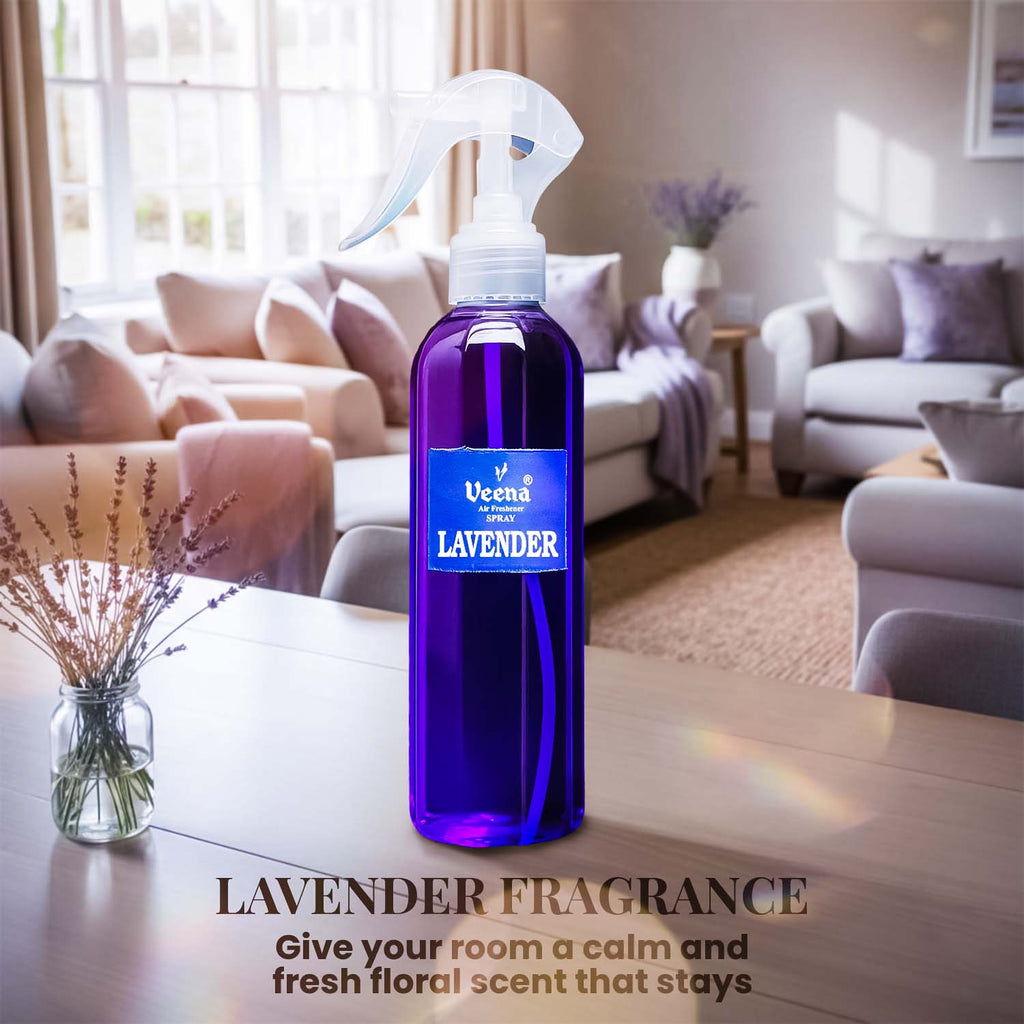Veena Lavender premium room freshener spray bottle displayed elegantly on a wooden table with a soft indoor houseplant background.