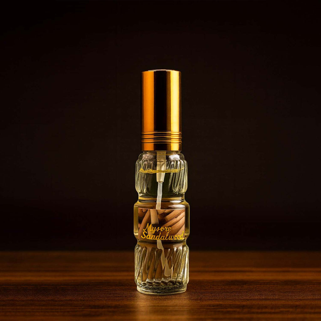 Veena Darbar Mysore Sandalwood premium perfume concentrate ribbed glass bottle with golden cap