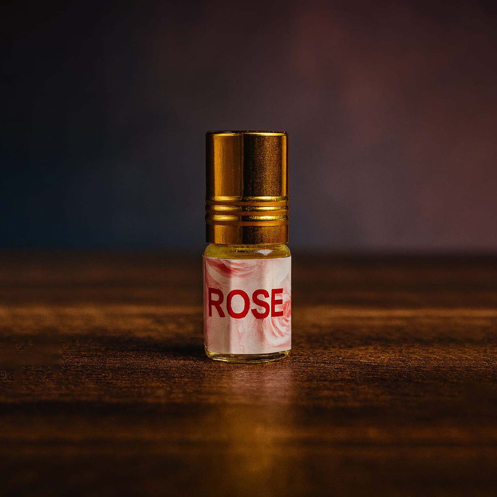 Veena Rose premium romantic gulab clothing perfume oil vial displaying its clear tone.