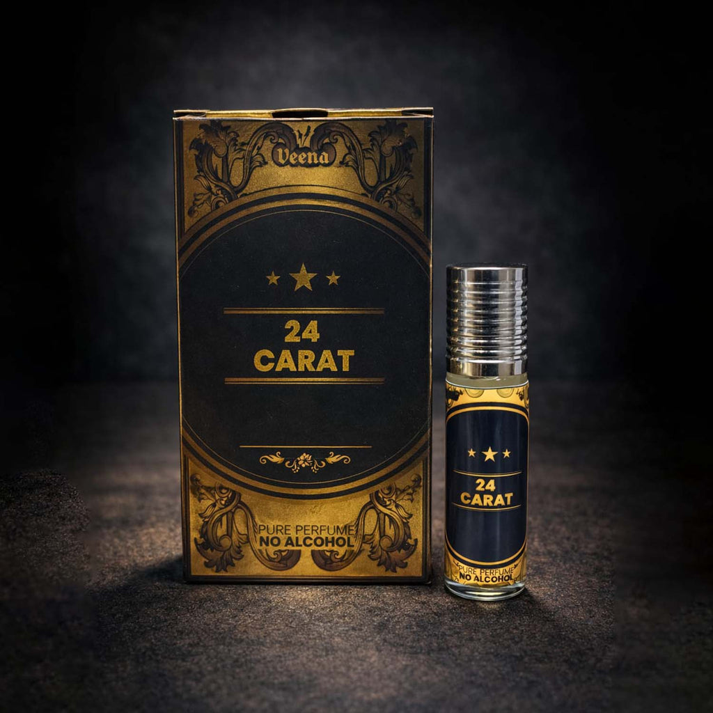 Veena luxury 24 Carat perfume oil pocket roll-on standing next to its premium black and gold Baroque presentation box.