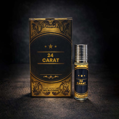 Veena luxury 24 Carat perfume oil pocket roll-on standing next to its premium black and gold Baroque presentation box.