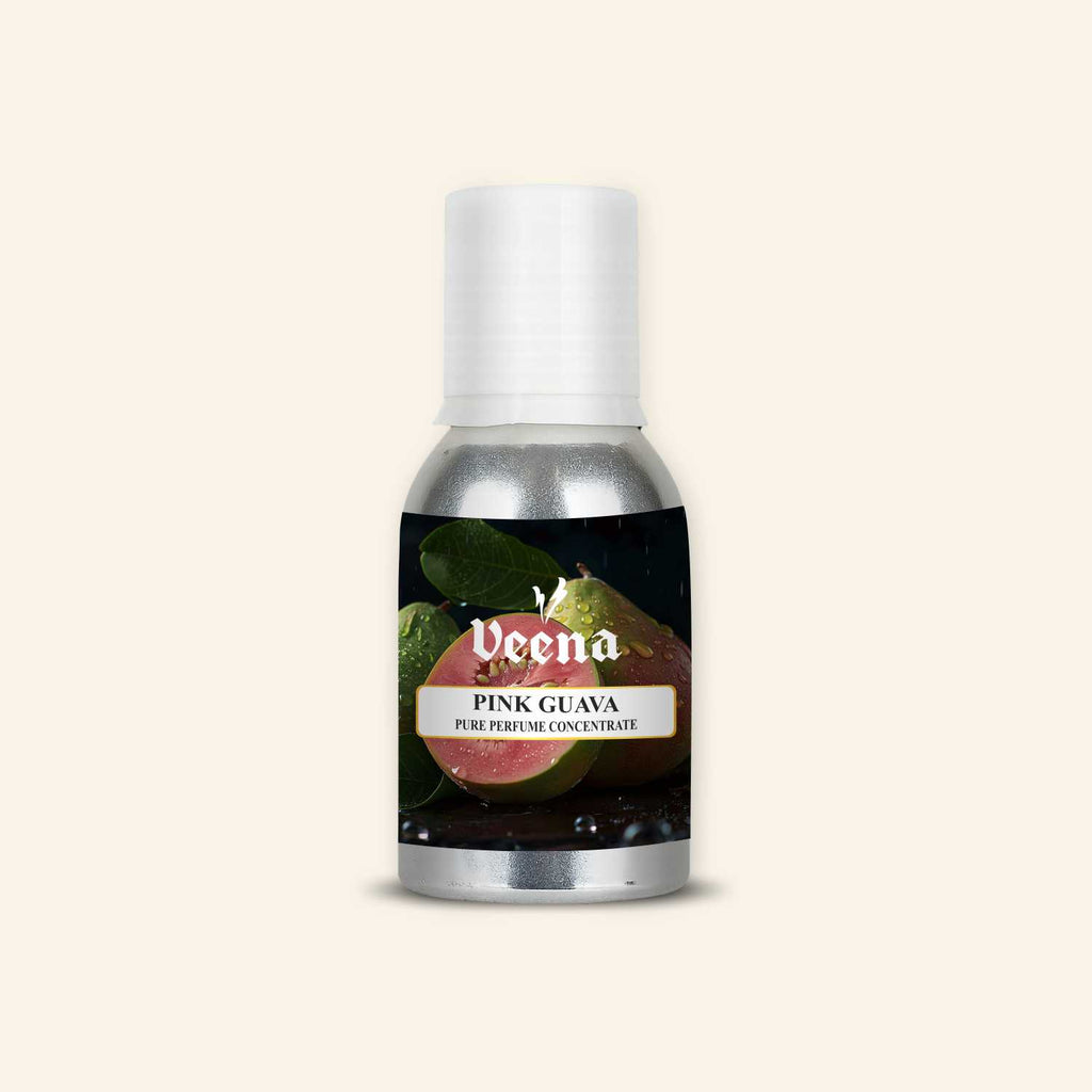 Veena Pink Guava Pure Perfume Concentrate bottle with deep dark background featuring a cut open ripe pink guava fruit illustration label.