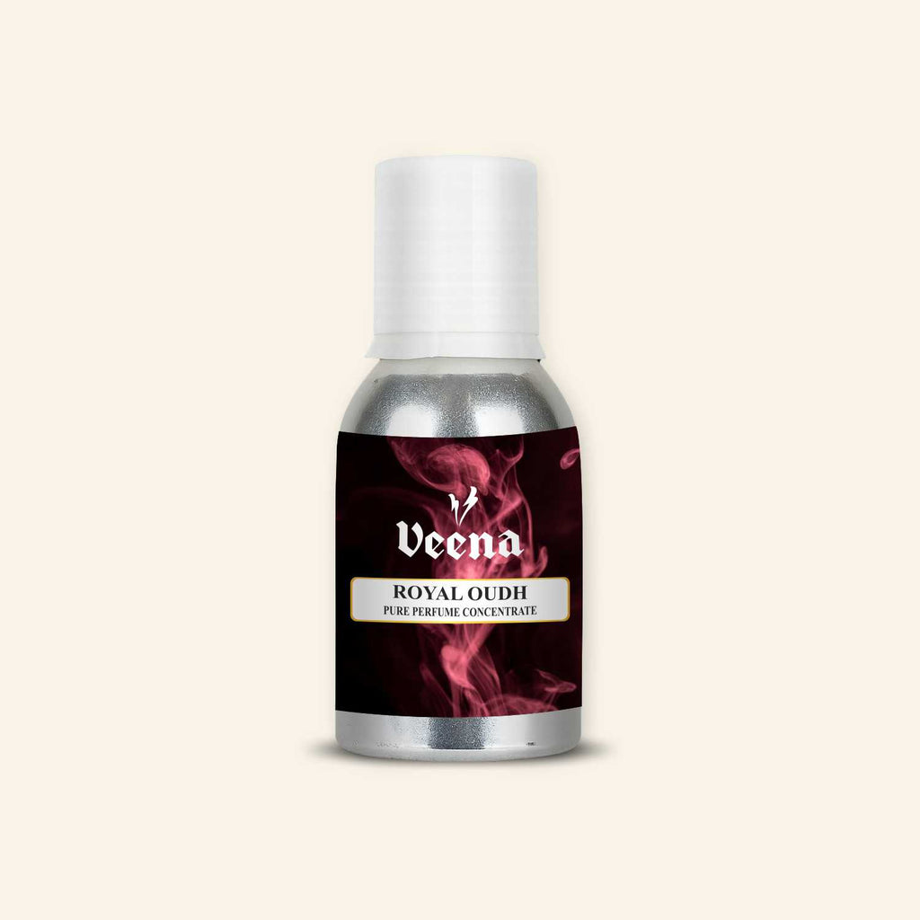 Veena Royal Oudh Pure Perfume Concentrate protective silver aluminum bottle with luxury dark background and red smoke graphic label design.