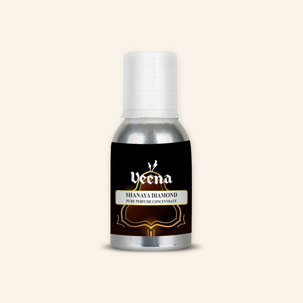 Veena Shanaya Diamond Pure Perfume Concentrate aluminum bottle with a premium black and golden dome architectural outline label design.