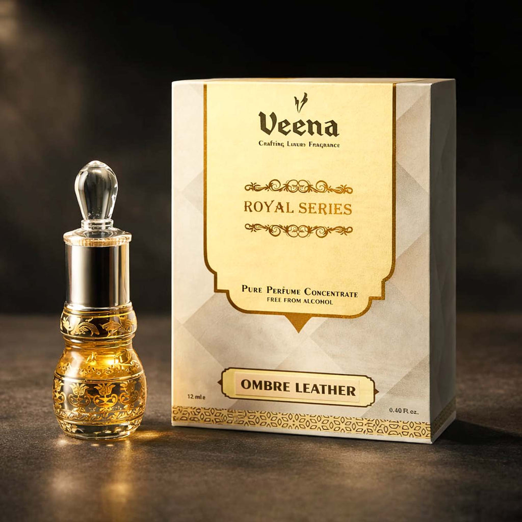 Veena Ombre Leather luxury non-alcoholic perfume oil decanter standing elegantly next to its gold and gray presentation box.