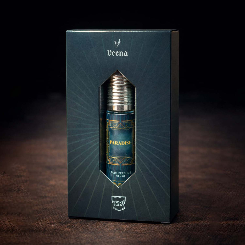 Veena concentrated Paradise attar roll-on bottle nested perfectly inside its custom diamond-window presentation gift box.