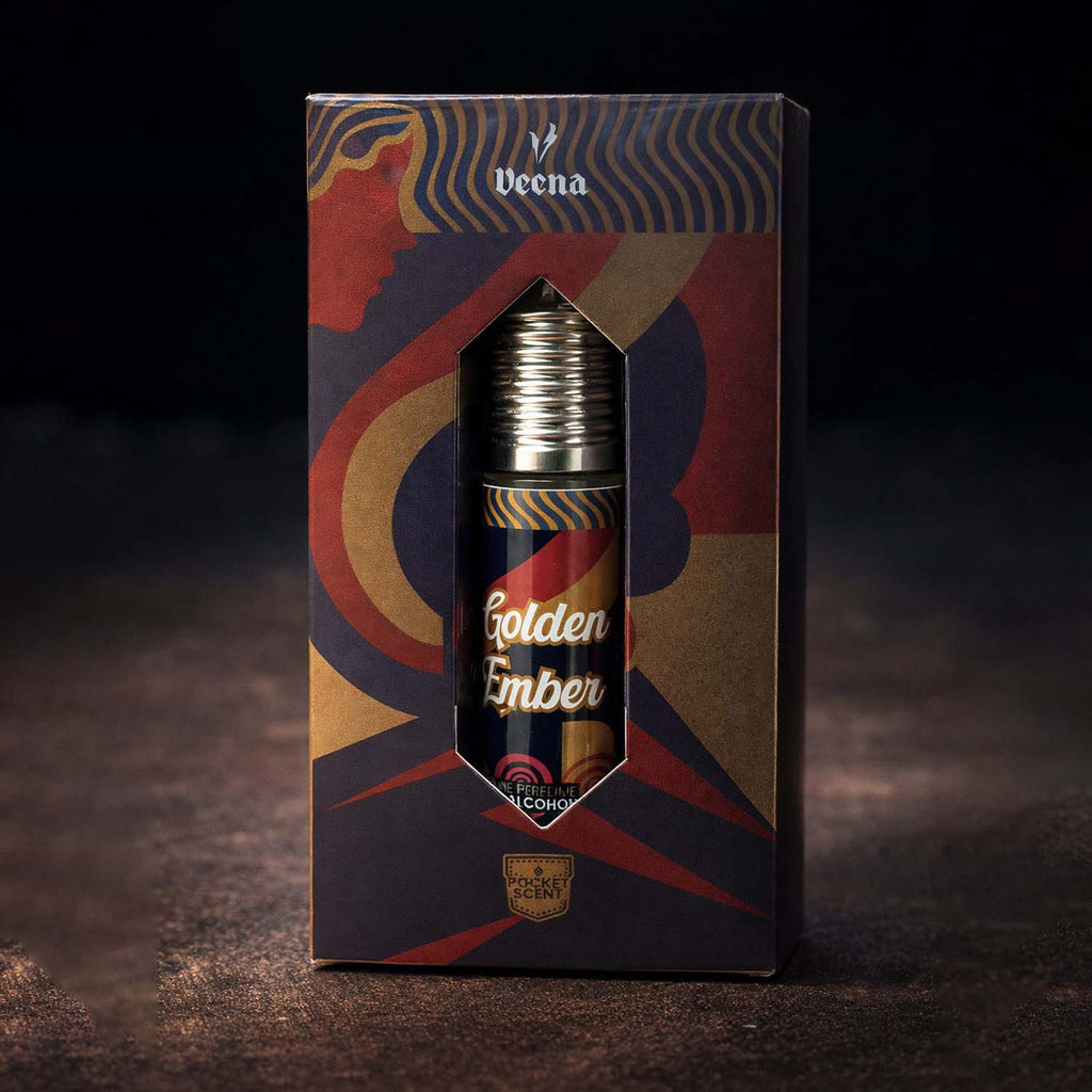 Veena concentrated Golden Ember attar roll-on bottle nested perfectly inside its custom diamond-window presentation gift box.