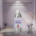Veena Lavender Floor Mopping Fragrance 500g aluminum bottle with a soft purple theme, shown next to a lavender mop and bucket.