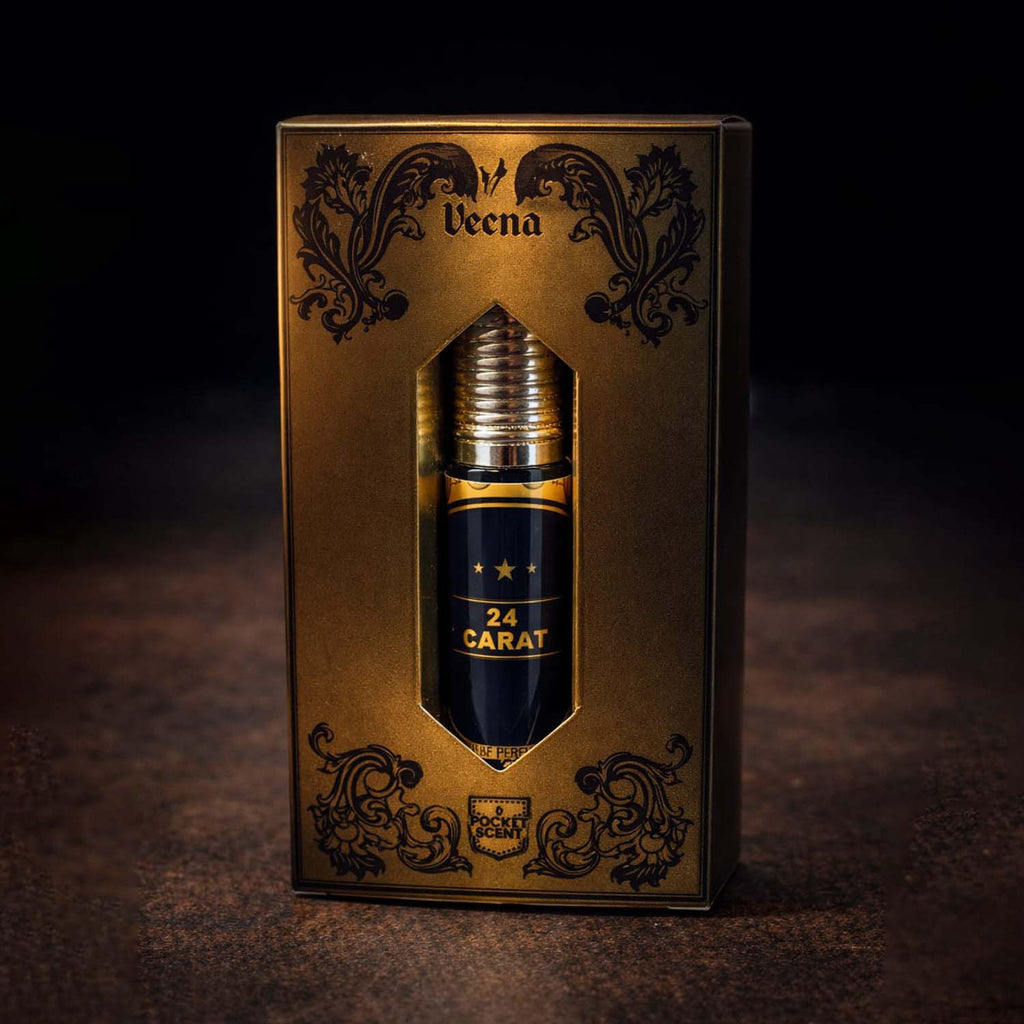 Veena concentrated 24 Carat attar roll-on bottle nested perfectly inside its custom diamond-window presentation gift box.