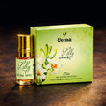 Veena Lilly of the Valley premium apparel attar concentrate bottle standing next to its luxury green floral presentation gift box.