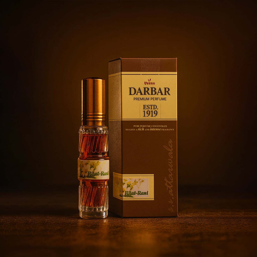 Veena Darbar Raat-Rani perfume bottle standing next to its heritage brown outer packaging box