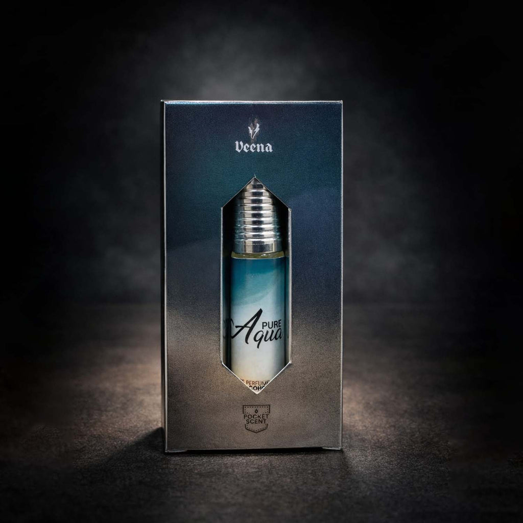 Veena concentrated fresh aqua attar roll-on bottle nested perfectly inside a custom diamond-cut silver presentation gift box.