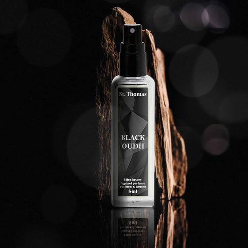 St Thomas Black Oudh premium 8ml apparel perfume bottle with a cinematic dark woody background