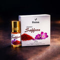 Veena Spanish Saffron premium apparel attar concentrate bottle standing next to its luxury white and gold presentation gift box.