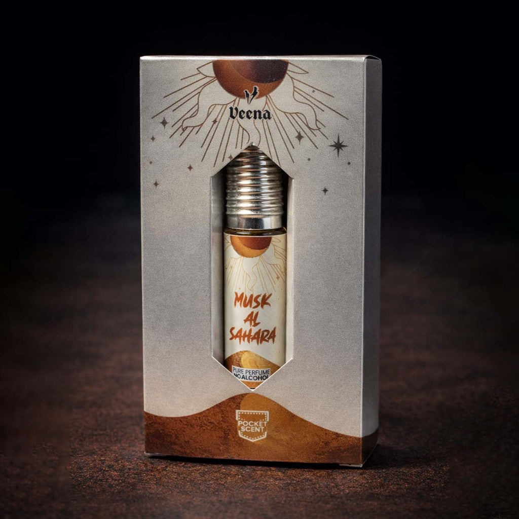 Veena concentrated Musk Al Sahara attar roll-on bottle nested perfectly inside its custom diamond-window presentation gift box.