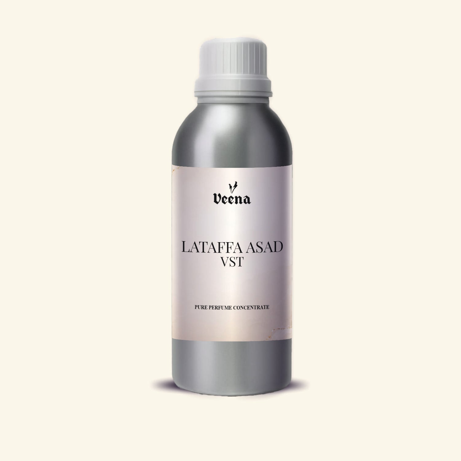 Veena Lataffa Asad Vst Pure Perfume Concentrate silver aluminum bottle with minimalist champagne silver label premium fragrance oil