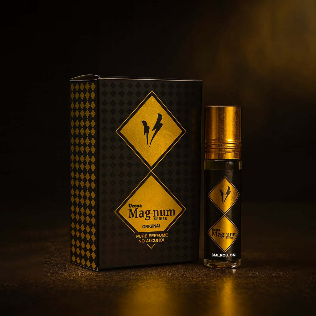 Veena luxury Magnum Series non-alcoholic perfume oil bottle standing next to its premium black and gold presentation box.