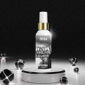Veena White Oudh Diamond premium attar spray 100ml bottle displayed on a white studio podium with glowing neon orbs.