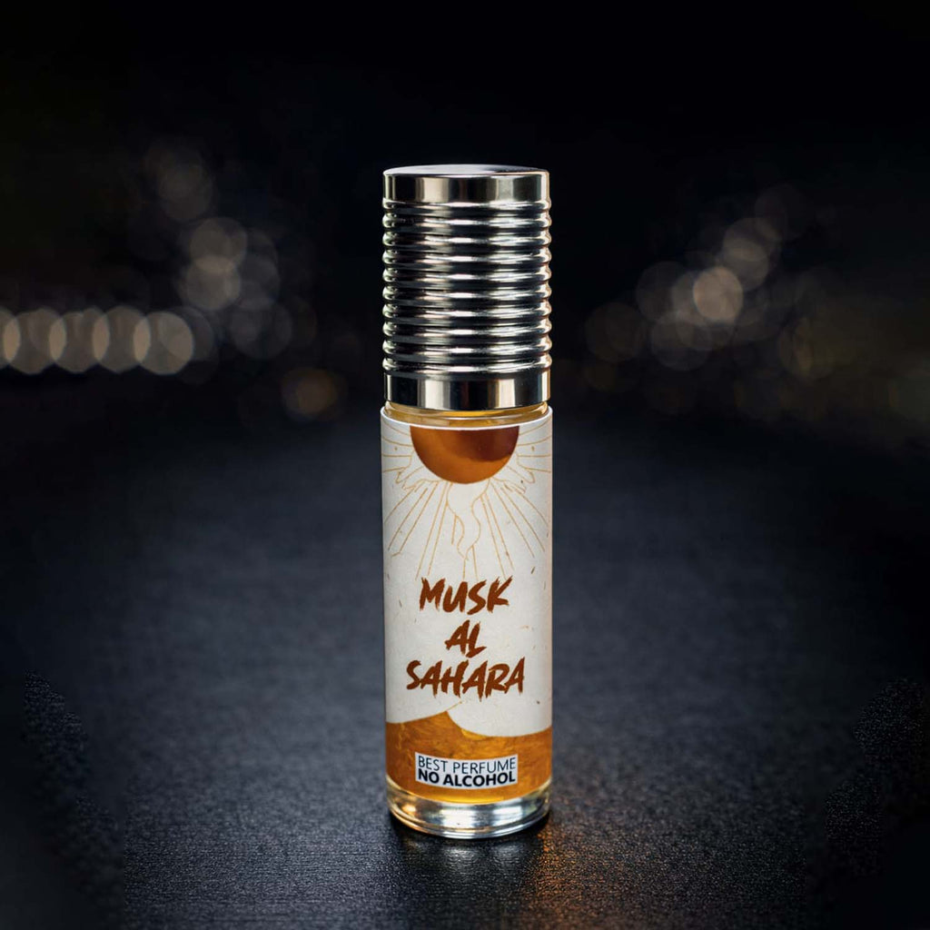 Veena Musk Al Sahara premium non-alcoholic perfume oil roll-on bottle with a solar eclipse label and ribbed silver cap against a dark bokeh background.