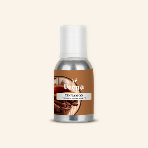 Veena Cinnamon Pure Perfume Concentrate aluminum bottle with an elegant cinnamon sticks illustration and rustic brown background label design.