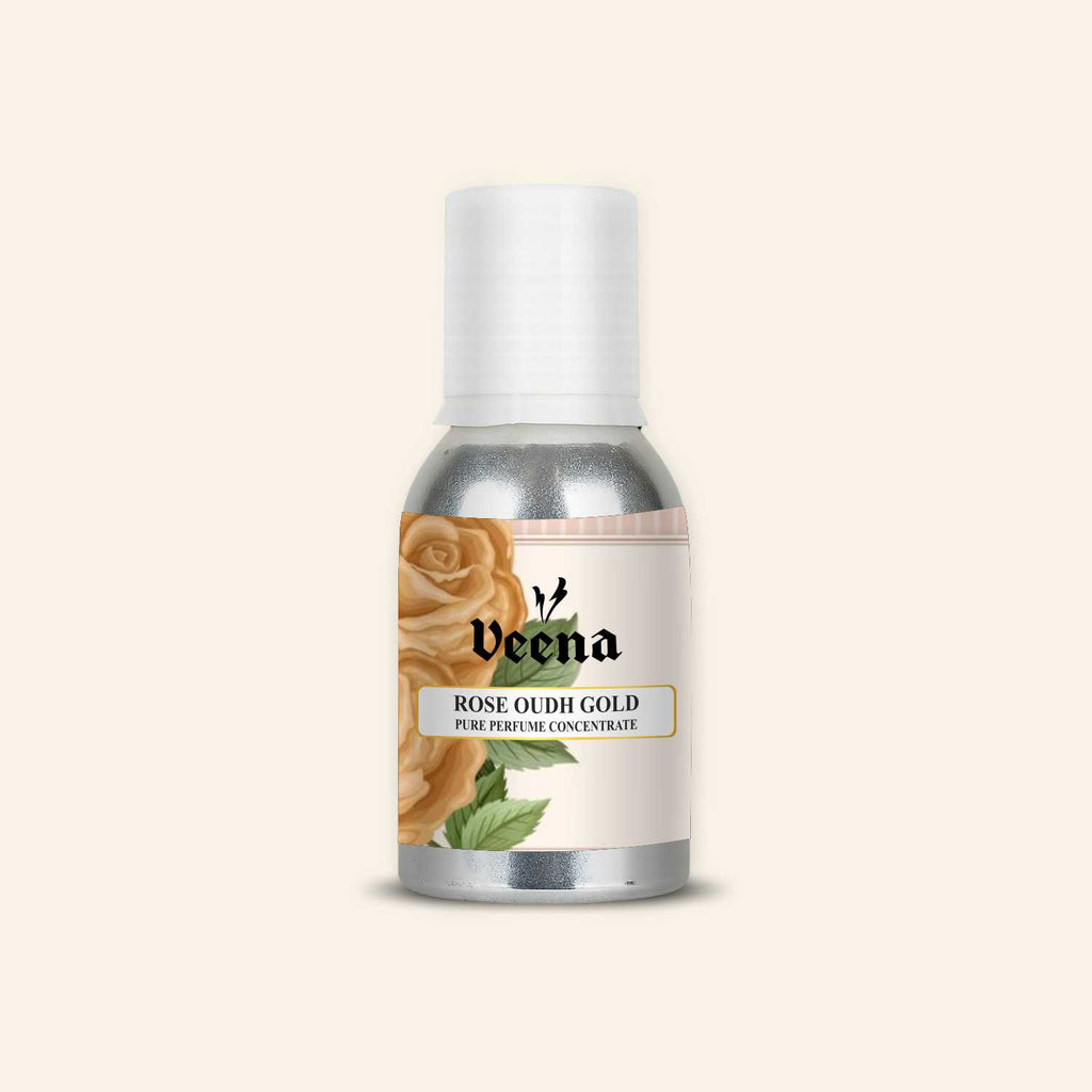 Veena Rose Oudh Gold Pure Perfume Concentrate aluminum bottle with an elegant golden rose illustration and green leaves label design.
