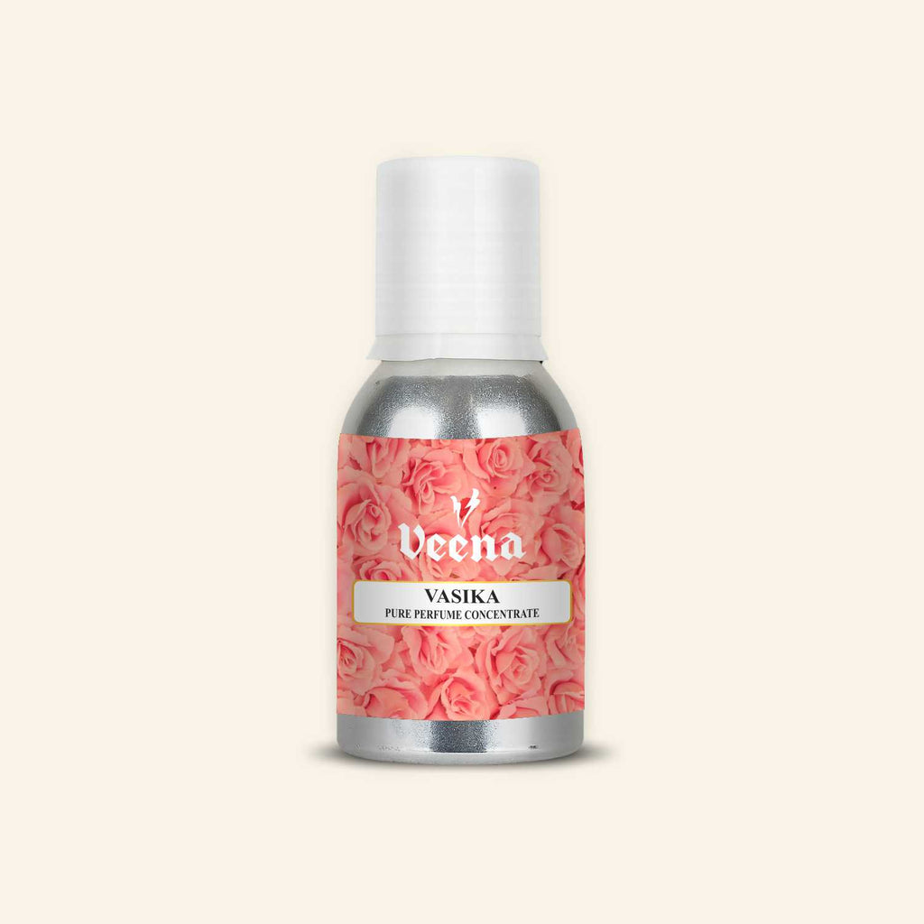 Veena Vasika Pure Perfume Concentrate aluminum bottle with premium pink rose floral pattern design label.