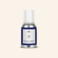 Veena Heaven Garden Pure Perfume Concentrate in a Premium Silver Aluminum Bottle with an Elegant White Center Label, Deep Blue Border, and a Geometric Mandala Star Logo