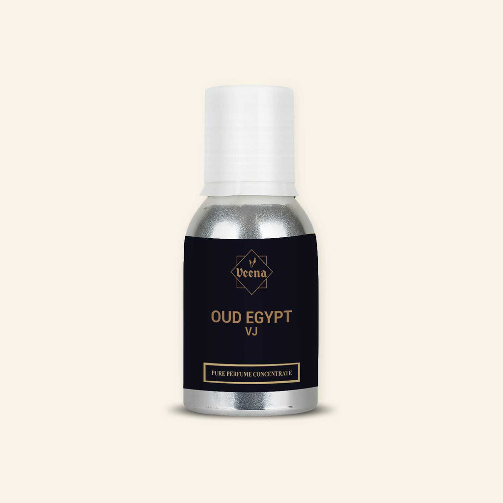Veena Oud Egypt VJ Pure Perfume Concentrate in a Premium Silver Aluminum Bottle with a Matte Black Label Featuring a Minimalist Gold Diamond Logo and Elegant Serif Typography