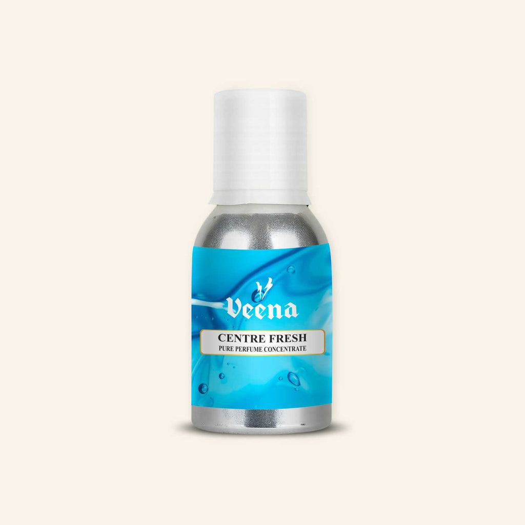Veena Centre Fresh Pure Perfume Concentrate silver aluminum bottle with dynamic liquid blue splash and fresh water droplets label design.