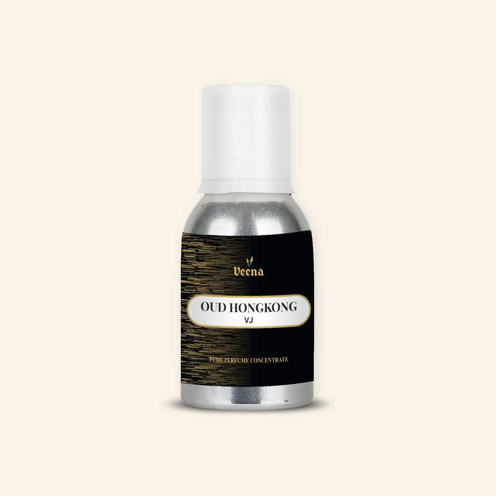 Veena Oud Hongkong VJ Pure Perfume Concentrate in a Premium Silver Aluminum Bottle with a Deep Black Label Featuring Gold Horizontal Streaks and an Elegant Cream Center Panel