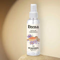 Veena Kesar Chandan alcohol-free attar spray 100ml bottle displayed on a natural light stone slab against a warm beige background.