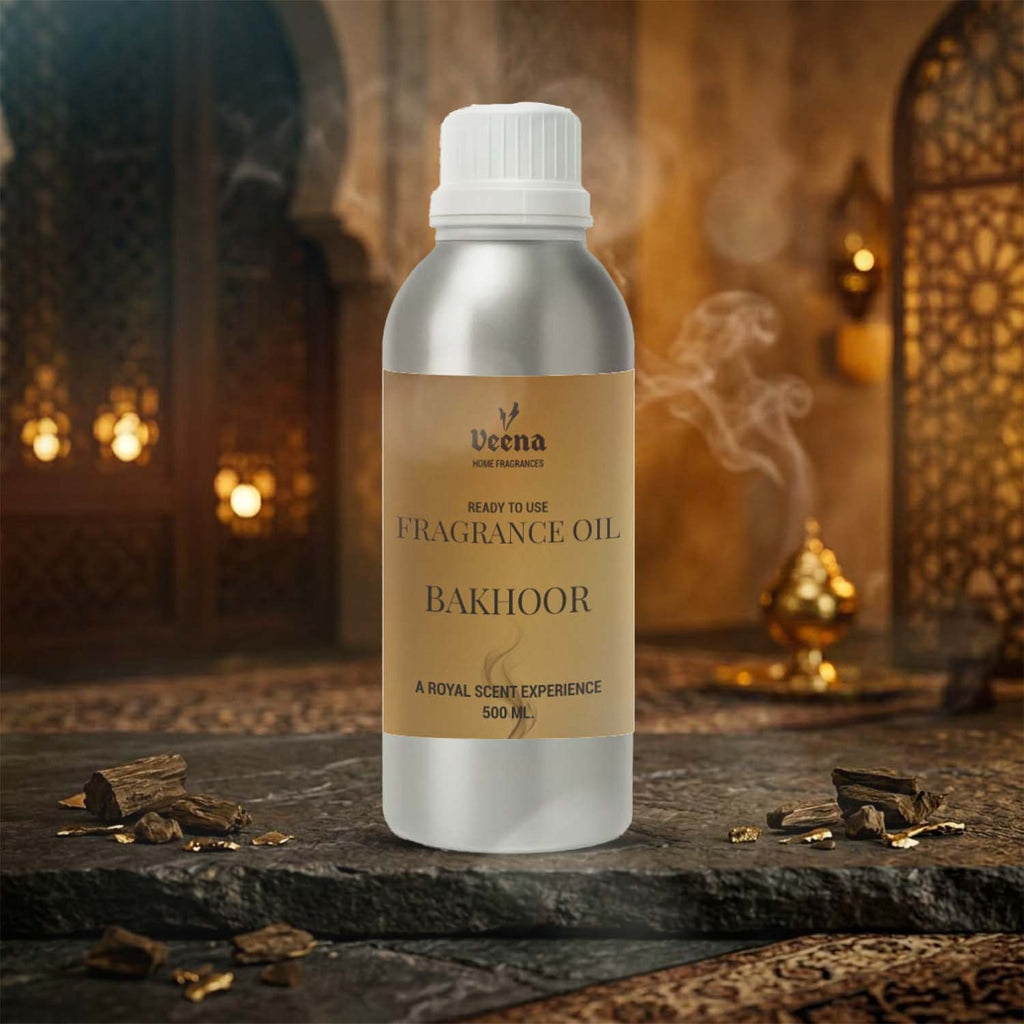 Veena Home Fragrances 500ml Bakhoor Fragrance Oil aluminum bottle placed on a dark stone surface with traditional Arabian palace architecture background.