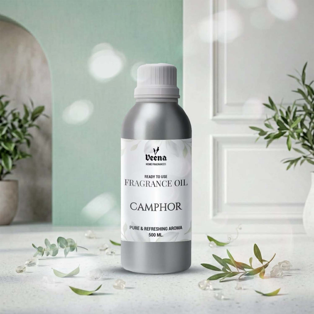 Veena Home Fragrances 500ml Camphor Fragrance Oil aluminum bottle on a table with a calm green arch and soft shadow background.