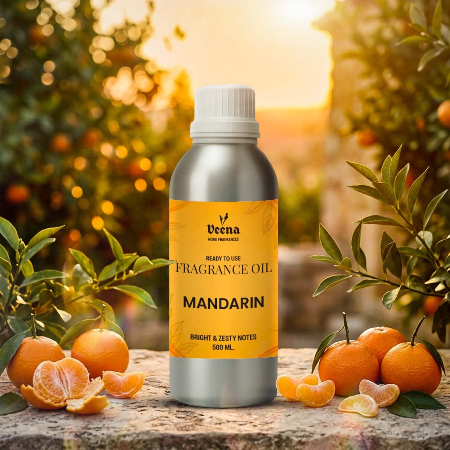 Veena Home Fragrances 500ml Mandarin Fragrance Oil aluminum bottle on a stone edge surrounded by fresh peeled mandarin slices and a sunlit orange orchard background.