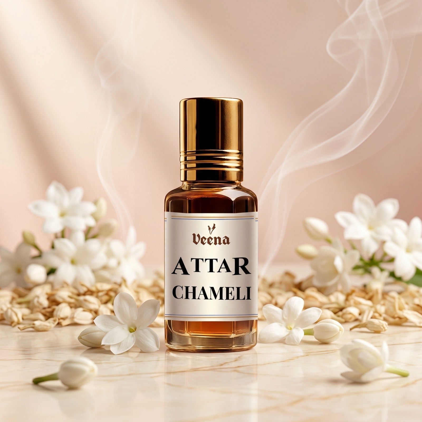 Veena Attar Chameli premium concentrated jasmine perfume oil bottle with a gold cap, set on a smooth marble surface surrounded by fresh white Chameli flowers, buds, dried petals, and elegant curls of aromatic smoke.