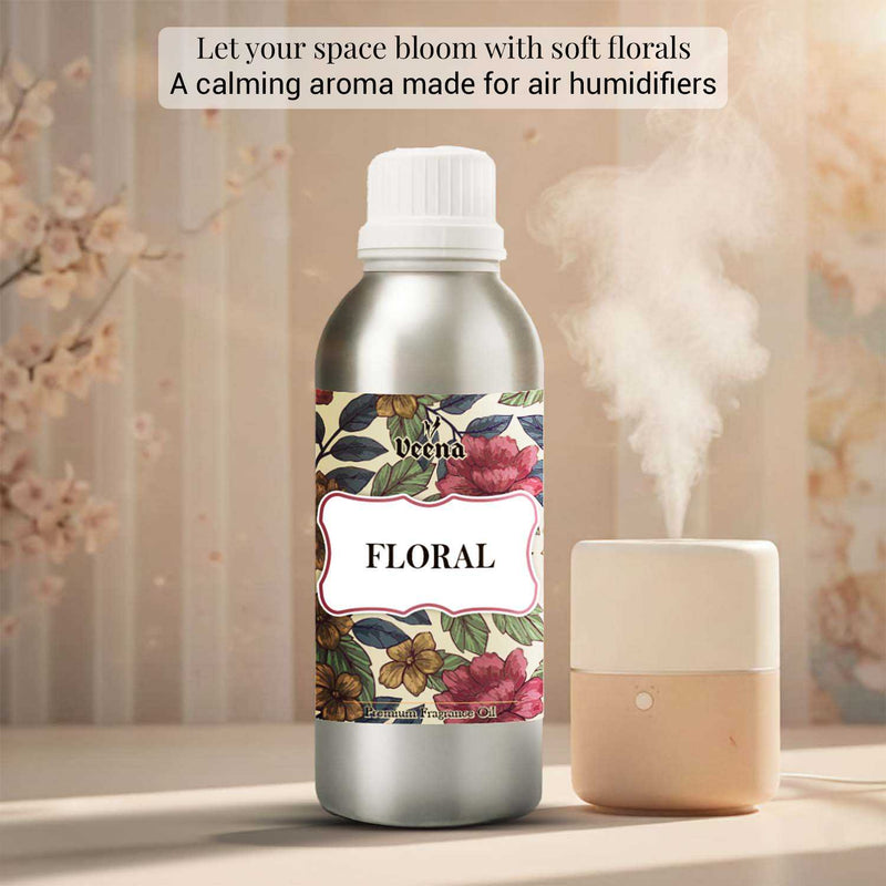 Veena Floral Premium Fragrance Oil aluminum canister showcasing an artistic floral motif label standing next to a cream-colored room humidifier.