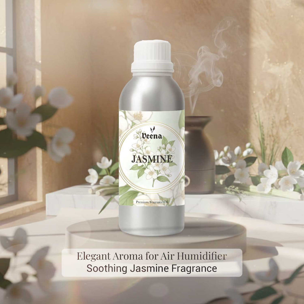 Veena Jasmine Premium Fragrance Oil canister standing on a round stone display platform surrounded by fresh white jasmine blossoms.