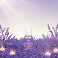 Veena Lavender Fragrance for Candle Making bottle showcased in front of a lush purple lavender field with glowing ground tea light candles.