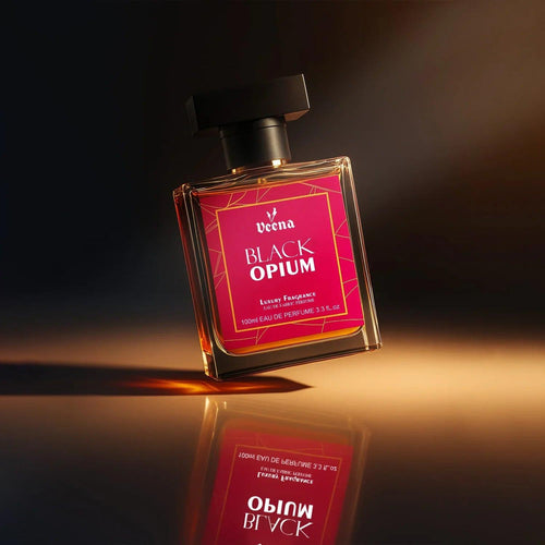 Veena Black Opium luxury fabric perfume bottle floating with dramatic studio lighting and warm reflection