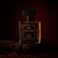 Veena Royal Oudh luxury fabric perfume bottle on dark mossy stone setup with dramatic lighting